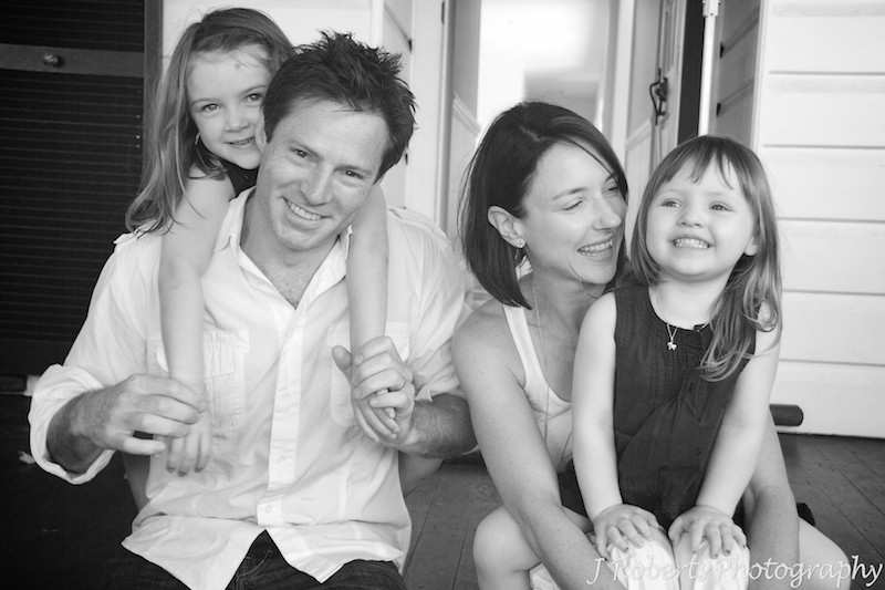 B&W portrait of a family of four - family portrait photography sydney
